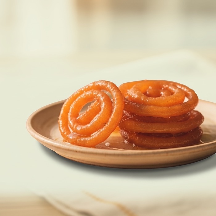 Crisp golden jalebi spirals